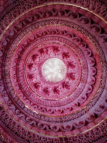 A vibrant pink circular ceiling with intricate geometric and ornate patterns for artistic decor. HD phone wallpaper