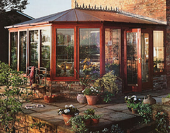 Sunroom, concrete, towels, brick, couch, cairs, basket, patio, flower pots, sunflowers, door, greenery, pillows, hat, vase, glass door, potted plants HD wallpaper
