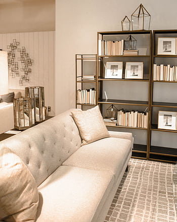 A stylish living room featuring modern furnishings and sleek interior design. HD phone wallpaper