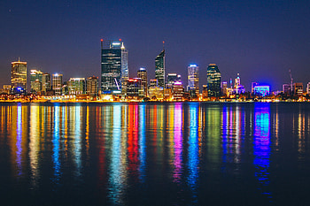 Cityscape, buildings, colorful, reflections, night HD wallpaper