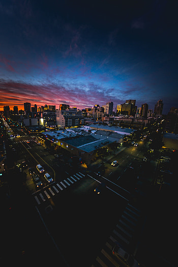 Cityscape, dark, aerial view, sunset, buildings HD phone wallpaper