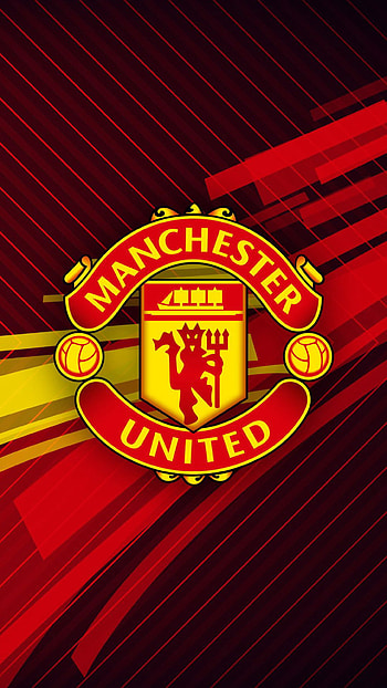 Manchester United, Striking , Iconic emblem, Dynamic visuals HD phone wallpaper