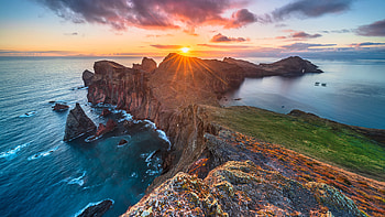 Greenery Rock Mountain Ocean Coast Waves Under Black Clouds Blue Sky During Sunset Nature HD wallpaper