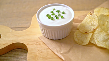 Potato chips, Sour cream dipping sauce, Mouthwatering treat, Stock video HD wallpaper