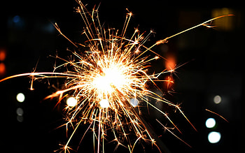 Sparkler celebration, Festive fireworks, Dazzling lights, Joyful moments HD wallpaper