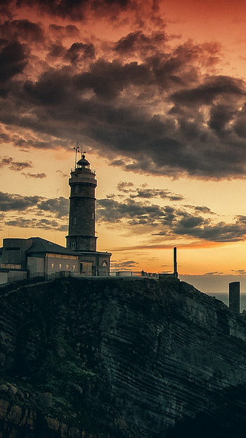 Lighthouse, , Rocks and sea, Stunning sunset HD phone wallpaper