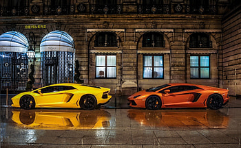 two lamborghinis parked in front of the ritz, rain, yellow, hotel, cars, orange HD wallpaper