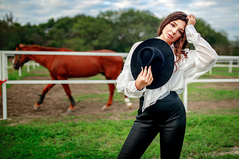 Cowgirl with her Horse, horse, cowgirl, fence, brunette, hat HD wallpaper