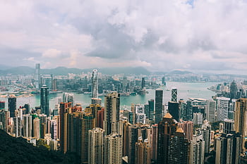 Panoramic view of Hong Kong skyline with skyscrapers and Victoria Harbour from Victoria Peak. HD wallpaper