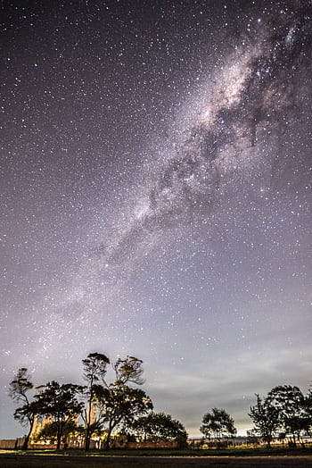 Breathtaking view of the Milky Way illuminating the night sky above El Chorro, Uruguay. HD phone wallpaper