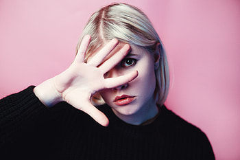 Blonde, hide face behind hand, woman HD wallpaper