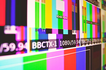 Vibrant test pattern screen with colorful bars and modern design. HD wallpaper