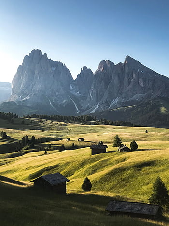 Stunning view of rolling hills and majestic peaks at Seiser Alm, perfect for nature lovers. HD phone wallpaper