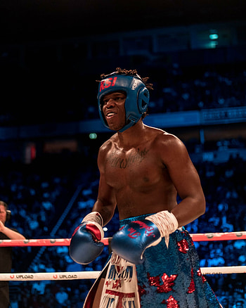 KSI vs Logan Paul ring walk, Rick Ross performance, New song debut, High-profile event HD phone wallpaper