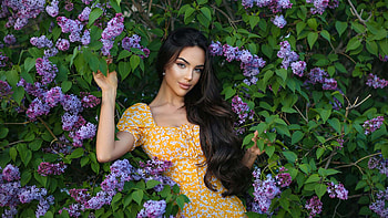 Blue Eyes Beautiful Girl Model Is Leaning Back On Purple Flowers Green Leaves Tree Branches Wearing Yellow Dress Girls HD wallpaper