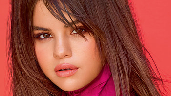 Closeup View Of Selena Gomez Is Wearing Pink Dress Standing In Red Background Girls HD wallpaper