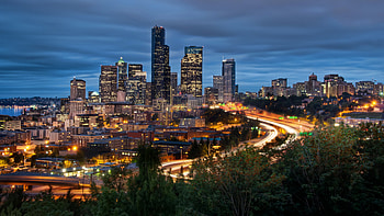 Cityscape View Of Buildings With Lights Road Green Trees Seattle Blue Sky Background Travel HD wallpaper