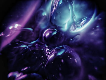 A vivid abstract with flowing purple and blue hues creating a mesmerizing effect. HD wallpaper