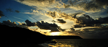 South Welsh Coast, Wales UK, blue, sea, dark clouds, sun, silhouette, rock HD wallpaper