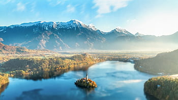 Majestic Lake Bled with church on island, surrounded by Julian Alps under sunset light. HD wallpaper