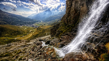 waterfall to a stream down the valley r, valley, waterfall, bridge, r, cliff, stream HD wallpaper