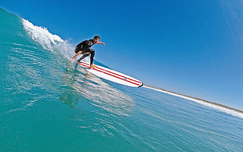Longboarding surf, Smooth gliding, Sunset views, Stylish maneuvers HD wallpaper