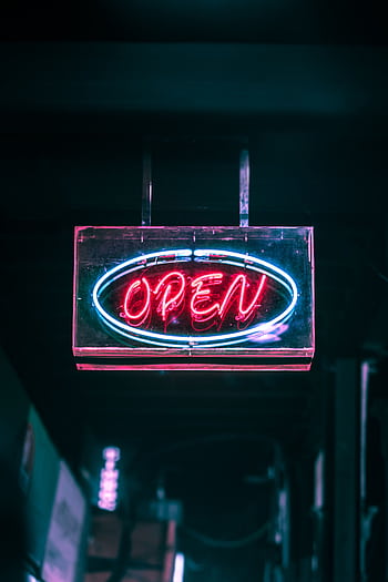 Glowing neon 'Open' sign illuminating the night street with vivid colors. HD phone wallpaper
