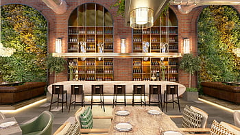 Elegant modern bar with lush indoor greenery and stylish furnishings in Bagad. HD wallpaper