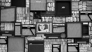 Vintage amplifiers and vinyl records arranged in a striking black and white pattern. HD wallpaper