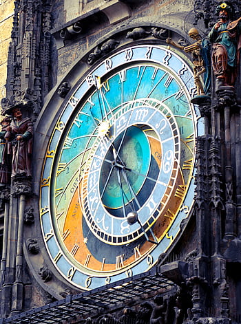 Close-up of Prague's historic astronomical clock featuring intricate details and vibrant colors. HD phone wallpaper