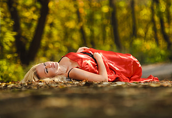 Beauty in Red, lady, blonde, lying, red, trees, road, dress HD wallpaper