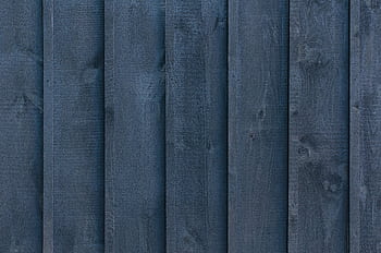 Detailed texture of vertical blue wooden planks in a fence backdrop. HD wallpaper