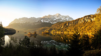 Landscape View Of Snow Covered Greenery Mountains Under Blue Sky Reflection On Lake Nature HD wallpaper