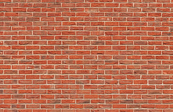 A classic red brick wall background, perfect for design and architectural themes. HD wallpaper