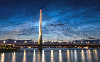Bridge in Riga, Latvia, river, suspension, lights, Latvia, bridge, dusk HD wallpaper