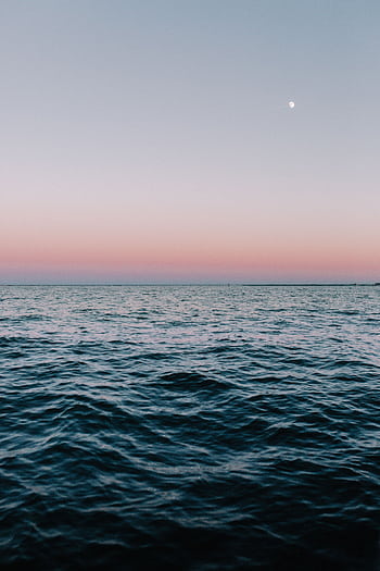Tranquil twilight sea view in Norfolk, VA, with calming waves and pastel sky hues. HD phone wallpaper