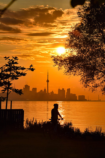 Sunset, Sea, City, Building, Silhouette, Miscellanea, Miscellaneous HD phone wallpaper