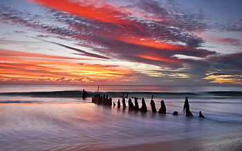 Sunrise, colorful, sand, morning, colors, peaceful, beauty, beach, waves, ocean, sea, good morning, beautiful, view, clouds, nature, sky, lovely, splendor HD wallpaper