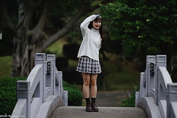 : Asian Woman on Tranquil Garden Bridge HD wallpaper
