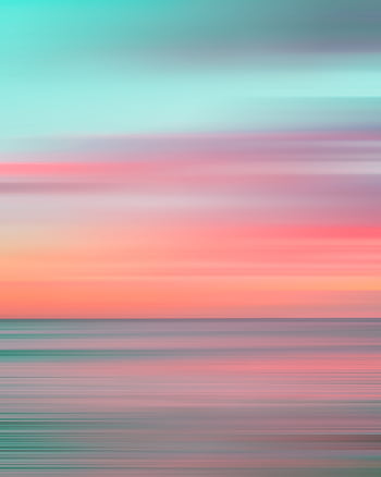 Colorful motion blur capturing a stunning Hawaiian sunset over the ocean. HD phone wallpaper
