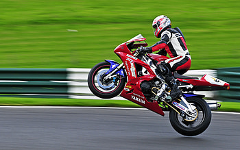 Motorcycle Racing, Yamaha Supermoto, Stunt performer, Thrilling road racing HD wallpaper