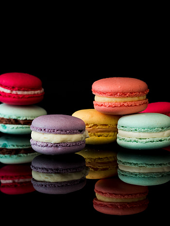 yummy macarons, Black glossy background isolated, Delicious treats, Colorful macarons HD phone wallpaper