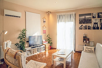 Bright, modern living room interior with neutral tones in Kavala, Greece. HD wallpaper