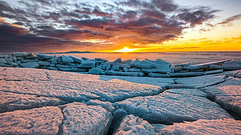 Stacks of sea ice on the shore of Estonia, sun, sunrise, baltic, snow, clouds, colors, sky HD wallpaper
