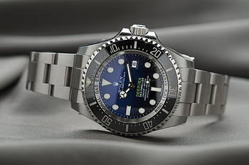 High-end Rolex wristwatch showcasing precision engineering and luxury design. HD wallpaper