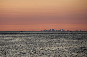 Sunset, sea, sky, city HD wallpaper