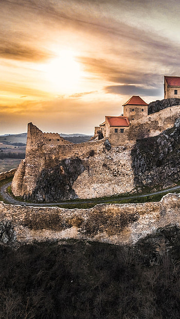 Sunset over Rupea Citadel, Romania HD phone wallpaper
