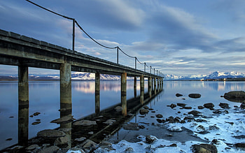 blue rocky beach, blue, architecture, bridge, water, rocks HD wallpaper