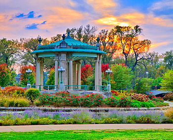 Evening repose, gazebo, clouds, trees, flowers, restful, sunset, beauty HD wallpaper
