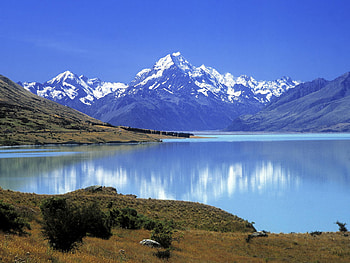 Beautiful Blue Lake, blue, snow, grass, mountains, lake HD wallpaper
